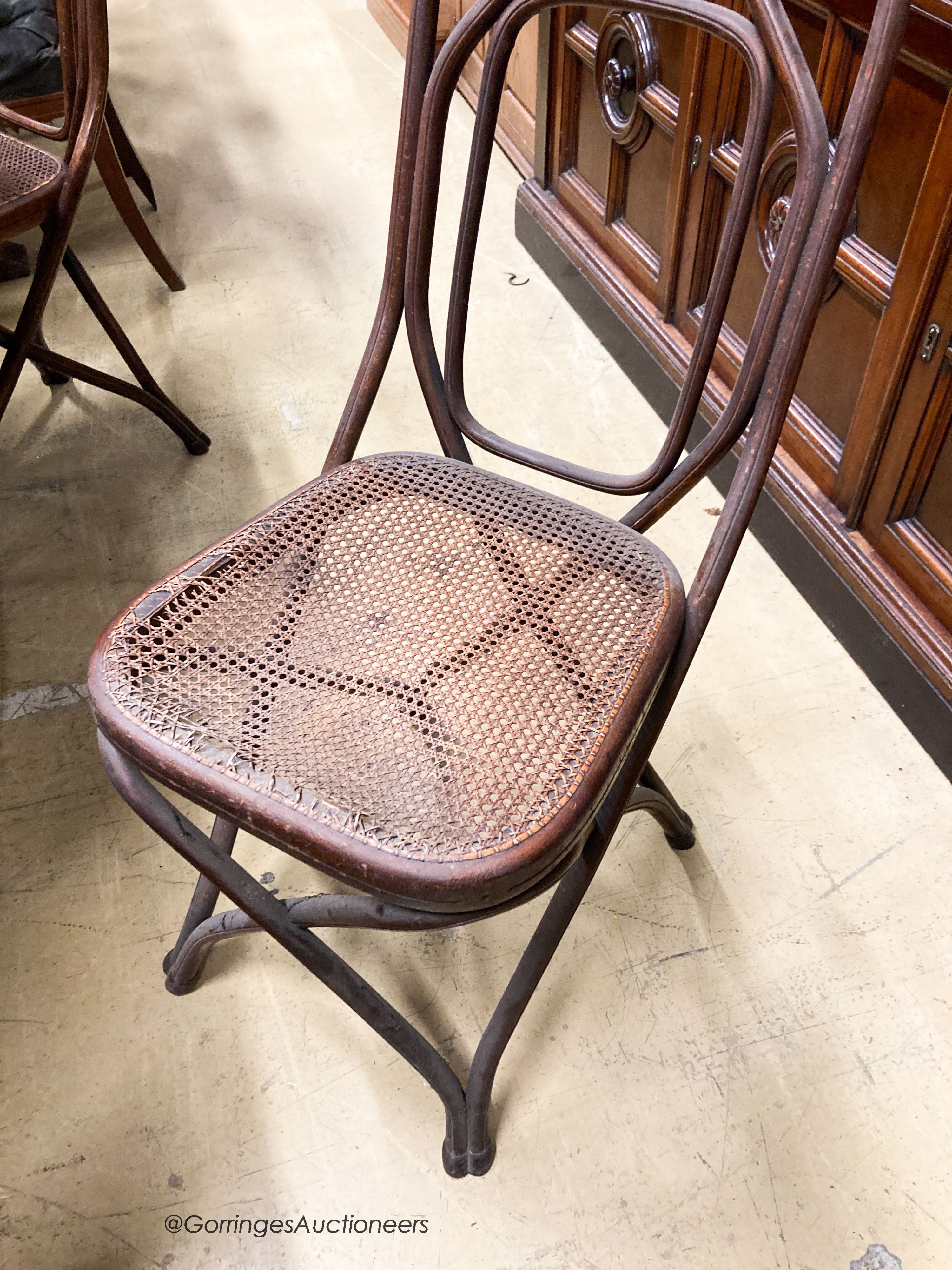 A set of five Thonet style caned beech bentwood chairs